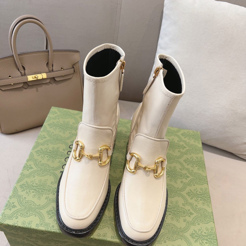 G*u*i boots